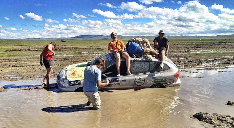 Motoring Monks stuck in a river on the Mongol Rally