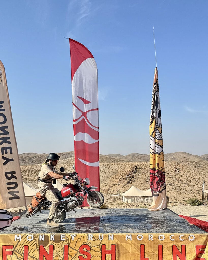 Rider Wheelie onto finish line stage, Monkey Run Morocco October 2025.